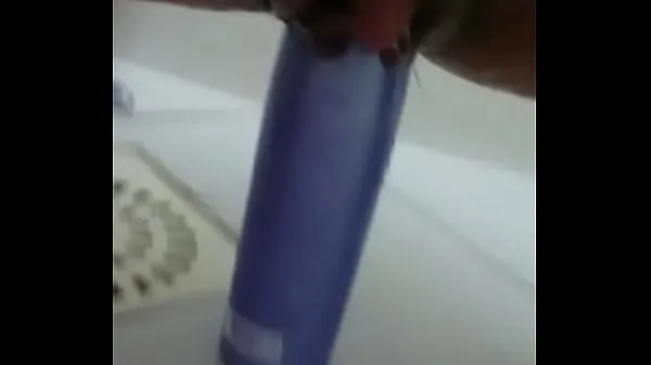 Big Stuffing the shampoo into the pussy and the growing clitoris best Clips