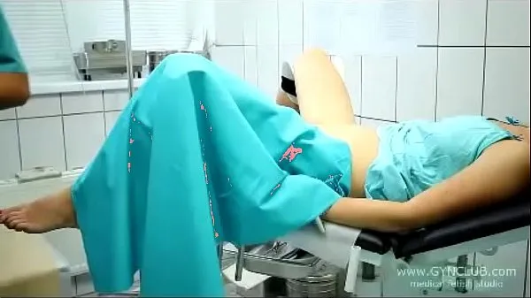 Veliki beautiful girl on a gynecological chair (33 najboljši posnetki